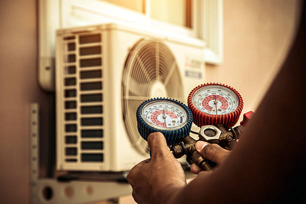 Professional Air Conditioning Service technician working in West Chatham, MA